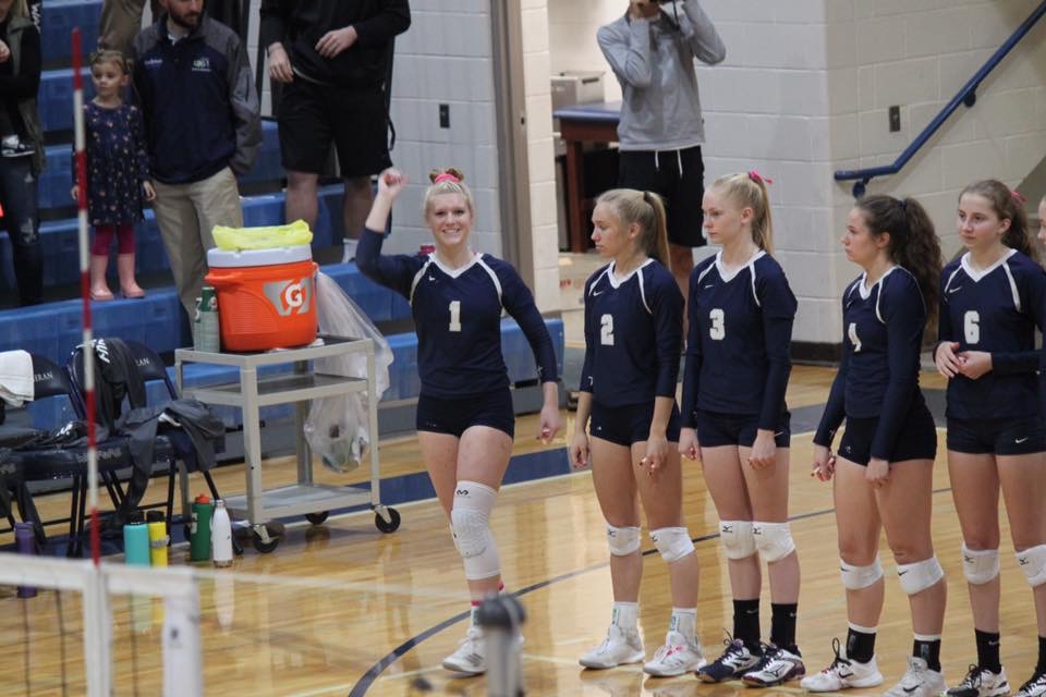 Lexie waving in starting line up