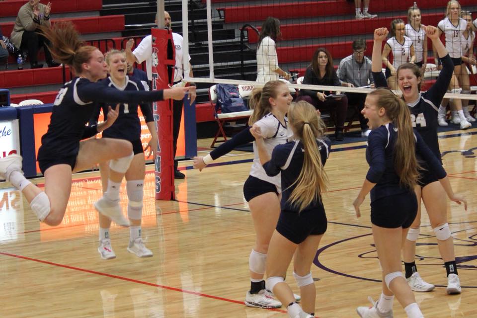 Players Celebrate after a point