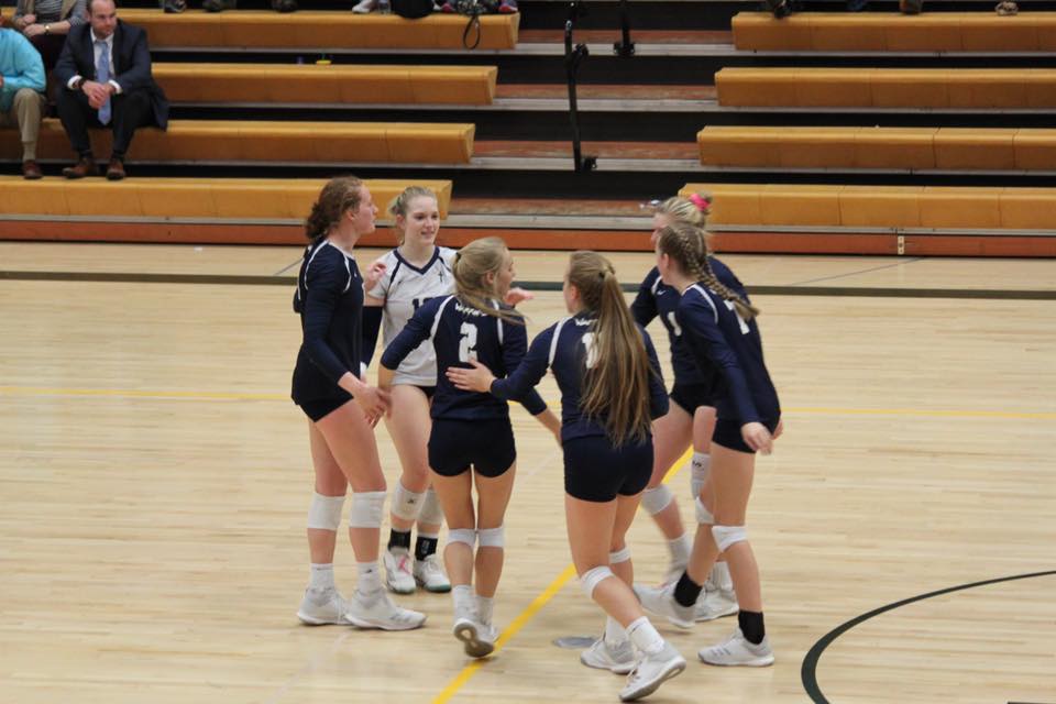 Team celebrating after point