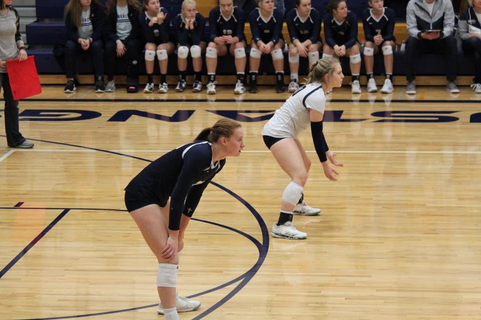 Marriah and Erin get ready to pass.