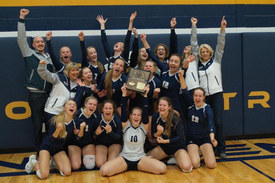Team Cheers for picture with the District Plaque