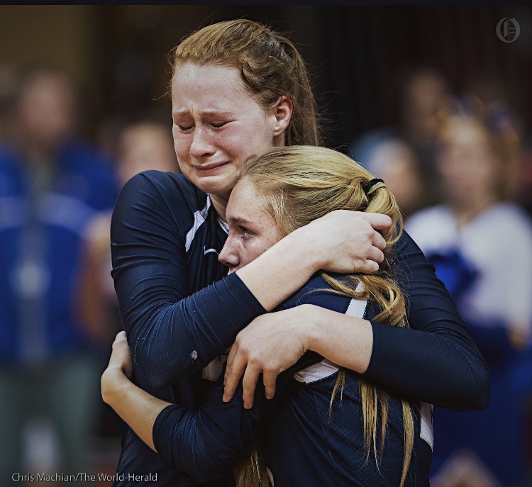 Hope and Marriah Hug after a loss in the State Championship.